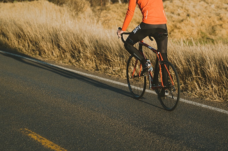 Best States for Bike Riding a Cyclist Riding Along a Road
