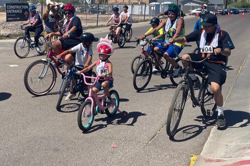 Indigenous Road Warriors ProLids Donation a Group of People Riding Bikes at the Indigenous Road Warriors Bike Riding Event