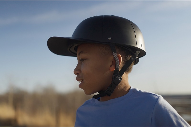 How to Adjust Helmets for a Better Fit Close Up of a Little Boy Wearing a ProLids Helmet