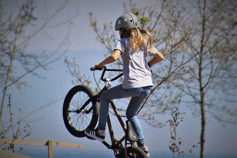 Tips for Picking the Right BMX Bike a Child Doing a Jump on a BMX Bike