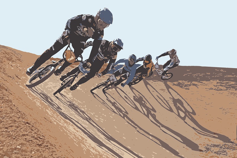Tips for Picking the Right BMX Bike BMX Riders Racing on a Dirt Trail