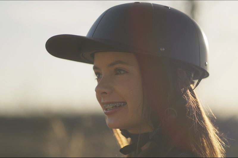 How to Know When to Replace Your Bike Helmet a Girl Wearing a ProLids helmet Outdoors