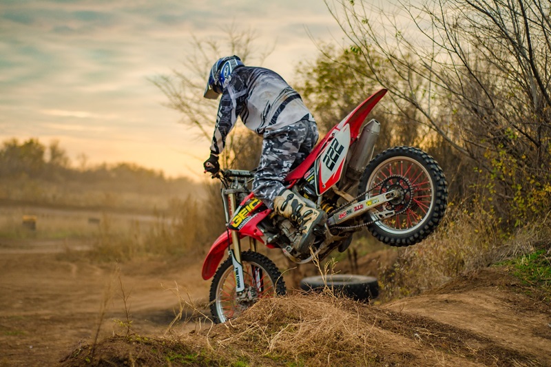 Best Dirt Biking Lessons for Kids in San Francisco a Person Riding a Dirt Bike Down a Dirt Hill