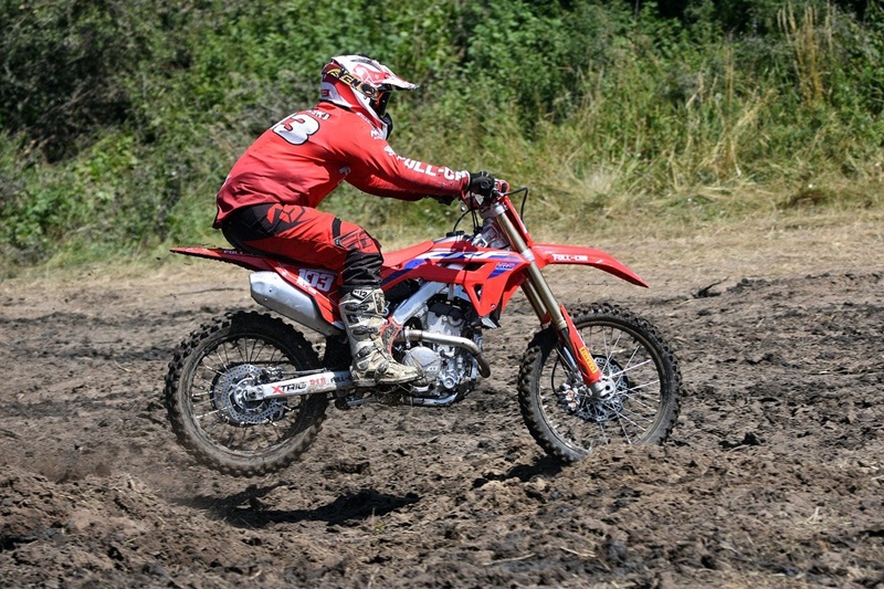 Best Dirt Biking Lessons for Kids in San Francisco a Person Riding a Dirt Bike on a Muddy Trail